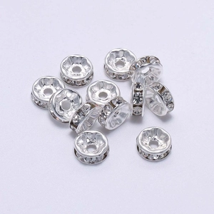 Macro detail of silver rhinestone spacer beads for DIY jewelry making and crafts