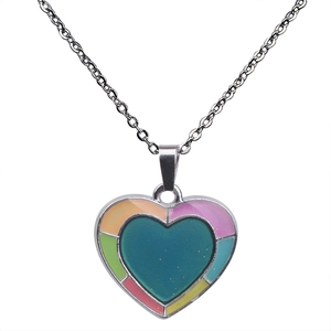Macro view of a colorful heart pendant necklace with multi-color enamel and silver chain