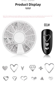 Detail of silver nail art studs kit with hearts and stars in a white storage box