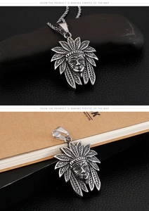 Macro detail of vintage steel Indian chief pendant with a textured 3D relief finish
