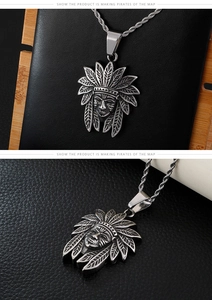 Close-up of vintage Indian chief pendant with detailed feather headdress and rope chain