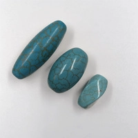 Macro shot of turquoise beads with natural black veins for DIY jewelry making