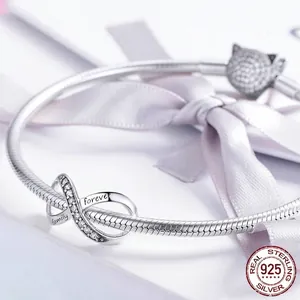 925 sterling silver snake chain bracelet featuring family infinity charm and cat clasp