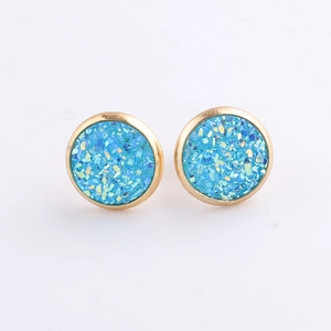 Detail view of 10mm gold plated stainless steel studs with blue mineral druzy texture