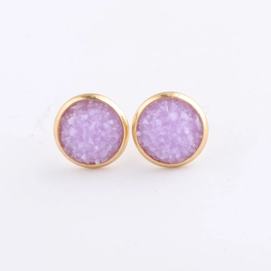 Macro detail of purple mineral cluster stud earrings with gold plated stainless steel rim