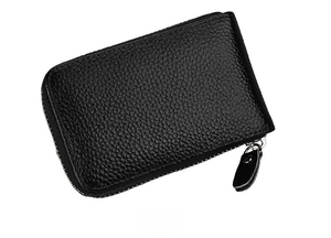 Side view of black pebble grain leather zipper card wallet with detailed texture