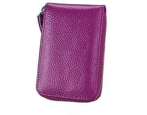 Detail view of the back of a purple lychee grain leather card holder with silver zipper