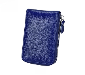 Detailed close-up of blue lychee texture leather card holder with silver zipper closure