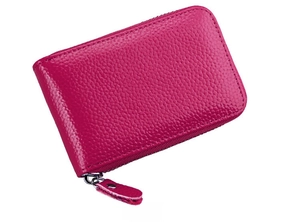 Side view of rose red leather card holder with zip closure and lychee grain texture