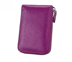 Detail view of purple lychee pattern leather wallet with premium silver zipper and stitching