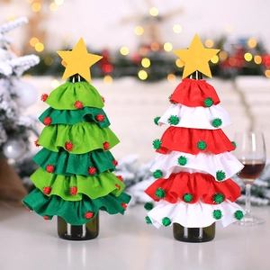 Festive Christmas tree shaped wine bottle covers in red and green felt with star toppers
