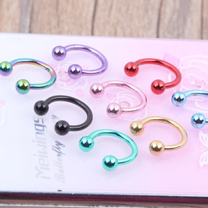 Classic stainless steel horseshoe piercing rings in multiple metallic colors and ball ends