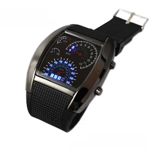 Detail of racing dashboard LED watch with metal case and textured silicone strap