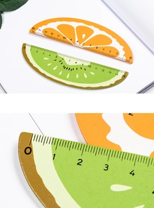 Close-up of 15cm wooden rulers in cute orange and kiwi fruit shapes with clear scales