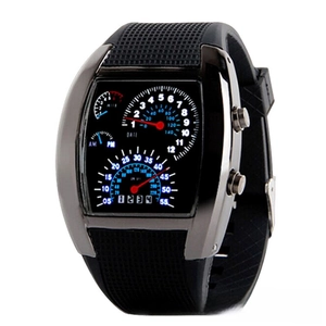 Detail view of racing dashboard dial design on a men's LED sports watch with silicone band