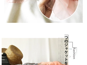 Detailed view of layered sheer chiffon scarves in various pastel colors and soft texture