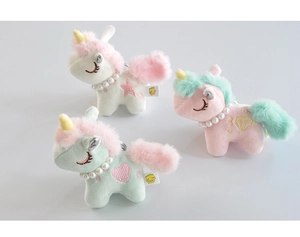 Detailed plush unicorn keychains with pearl necklaces in pastel pink, white and green