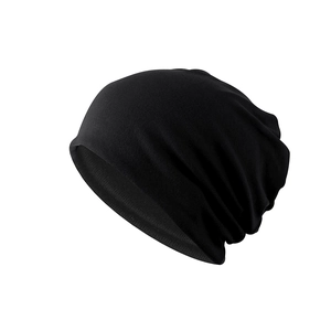 Minimalist black knitted beanie hat with warm thermal lining for winter fashion