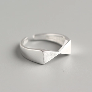 Adjustable 925 sterling silver ribbon bow ring with a minimalist geometric finish