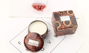 Detail of sunflower pattern tin scented candle with matching gift box and dried flowers