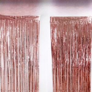 Rose gold foil curtain detail showing single vs double layer density for party background