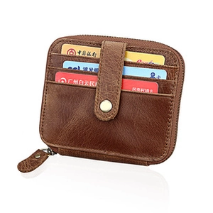 Detailed view of brown leather RFID card holder with zipper pocket and metal snap fastener