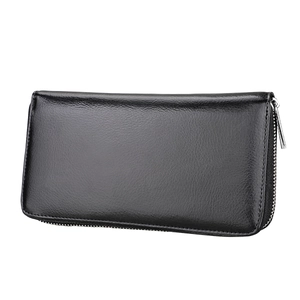 Detail of black pebbled leather texture and silver zipper on the RFID passport wallet
