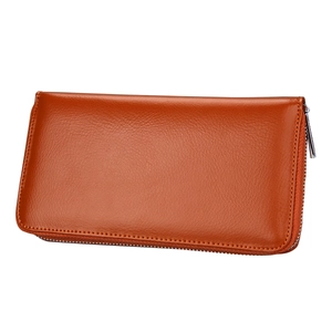 Detail of dark brown leather accordion wallet showing high-quality lychee texture and zipper
