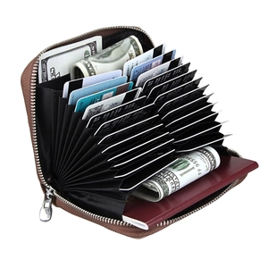 Brown leather RFID blocking accordion wallet with multiple slots for cards and passport