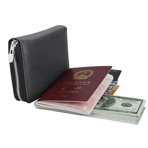 Detail of RFID leather wallet with multiple card slots, passport holder and zipper closure