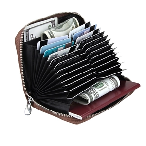 Coffee brown leather organizer showing multiple card slots and passport compartment