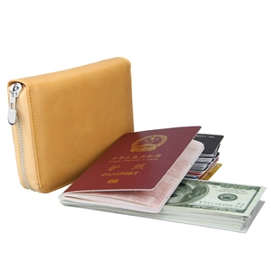 Detailed interior of a brown leather RFID wallet showing multiple card slots and passport pocket