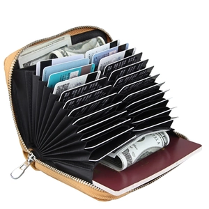 Detail view of camel leather RFID card holder with accordion slots and zipper closure