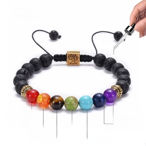 Bracciale diffusore di oli essenziali in pietra lavica con albero della vita e pietre chakra