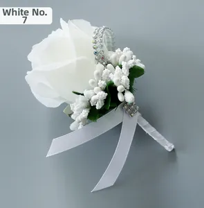 Detail of No. 7 white satin rose boutonniere with decorative berries and silk ribbon