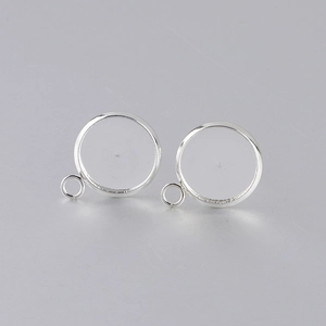 Macro shot of silver-plated stainless steel round earring stud bases with hanging loops