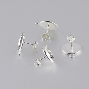Detail of four silver stainless steel earring stud bases with hanging loops for DIY jewelry
