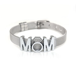 Detail of silver mesh bracelet with MOM lettering and diamond-set ring charm