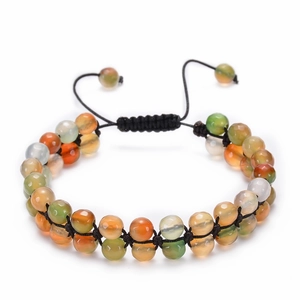 Detail of bohemian double-row faceted agate beads on a hand-woven adjustable bracelet