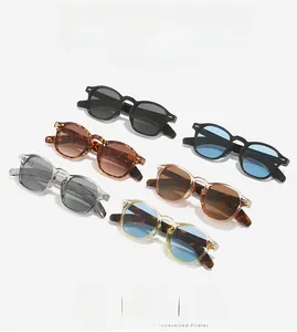 Detail shot of vintage square sunglasses in diverse colors with metal rivet accents