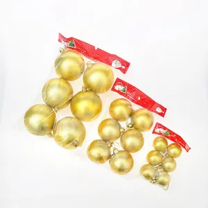 Matte gold Christmas ball ornaments set in three sizes for festive holiday tree decoration