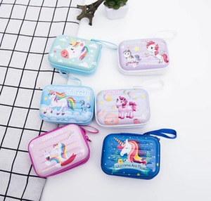 Detail of colorful cartoon unicorn rectangular tinplate coin purses with zipper closures