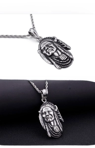 Detailed view of vintage Native American Chief pendant with aged silver finish