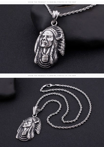 Detailed view of silver Indian tribal chief pendant with vintage metallic rope chain
