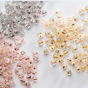Close-up of S925 silver butterfly earring backs in gold, silver, and rose gold with silicone