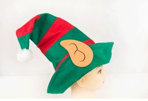 Detail view of a red and green striped elf hat with ears and a white pompom on top