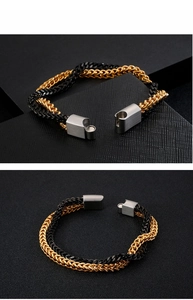 Detail of two-tone braided titanium steel bracelet with a matte magnetic cylinder clasp