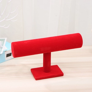Detail of red velvet T-bar jewelry display stand for bracelets and watches