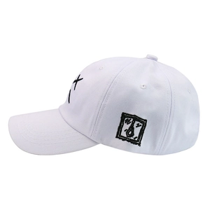 White baseball cap with minimalist black cross and portrait embroidery street style