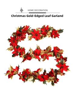 Detail of red poinsettia Christmas garland with gold-edged green leaves on white background
